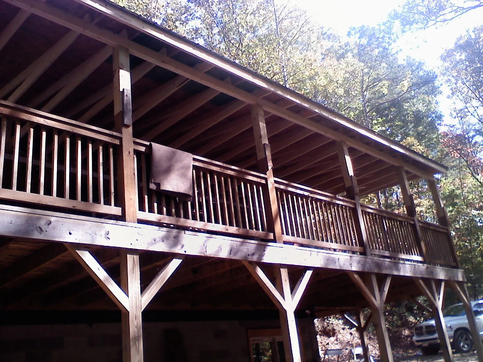 Timber framing under a new elevated porch and deck — Roof Leak Repair in Ranson by Roofing Brothers